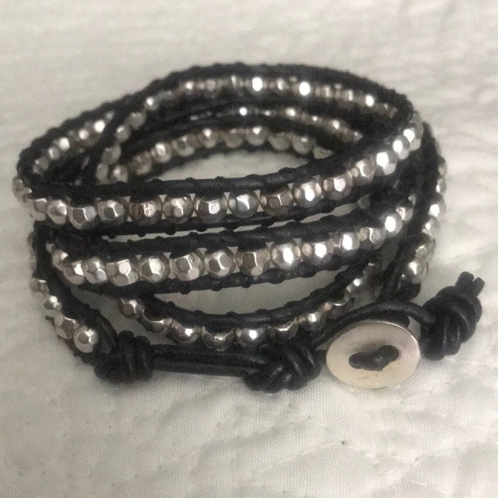 Silver bead and leather bracelet